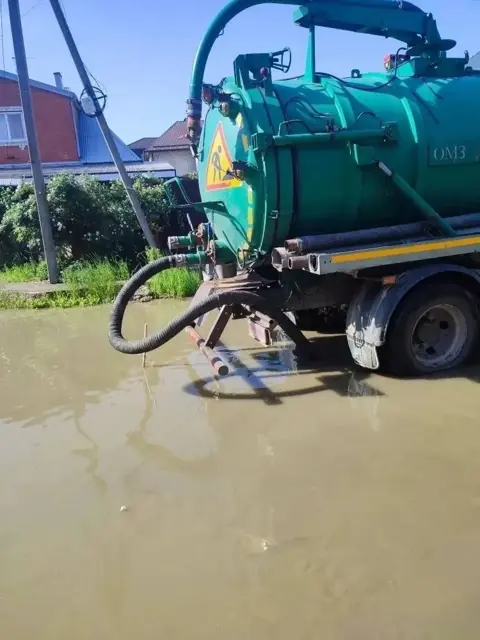Откачка воды из подтопленного двора